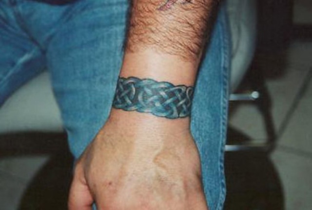 Blue wrist bracelet tattoo