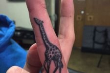 Cute giraffe tattoo