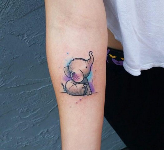 Cute little elephant on the arm