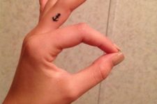 Cute tiny anchor on the finger