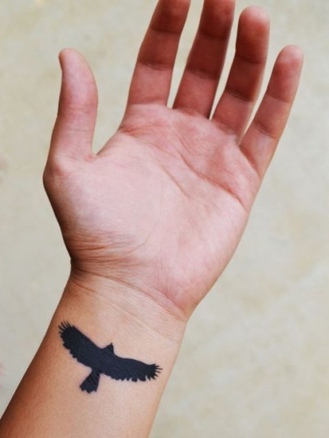 Eagle tattoo on the left wrist