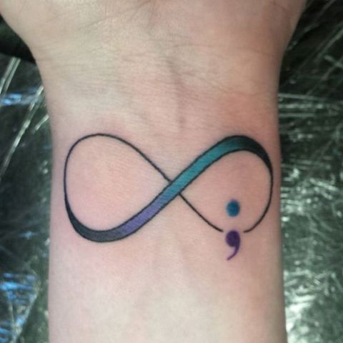 Infinity sign with semicolon tattoo