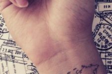 Map tattoo on the right wrist