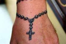 Rosary bracelet tattoo design