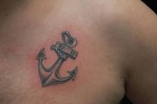 Silver anchor tattoo
