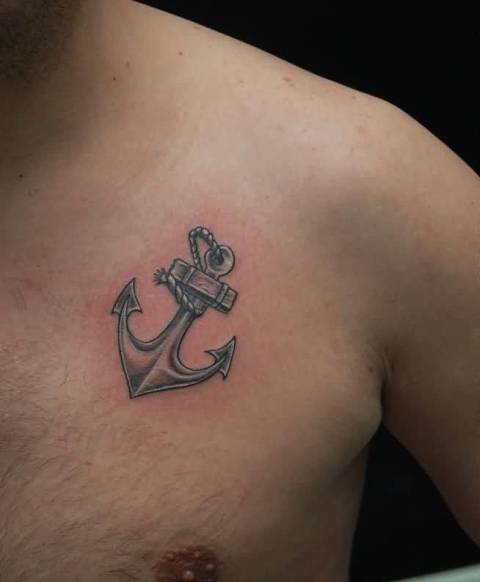 Silver anchor tattoo