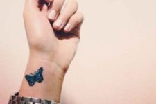 Simple blue tattoo on the wrist