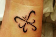 Simple but awesome butterfly tattoo on the wrist