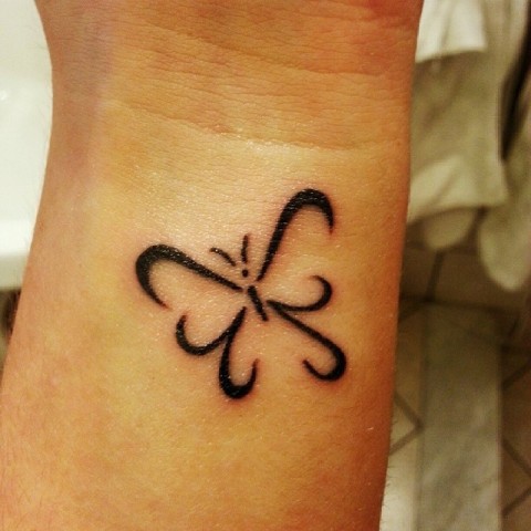 Simple but awesome butterfly tattoo on the wrist