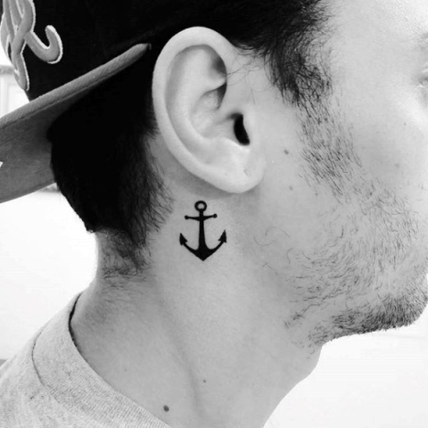 Small anchor tattoo behind the ears