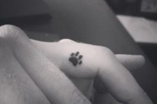 Small paw tattoo