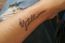 Two words tattoo on the left wrist