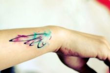 Watercolor wing tattoo