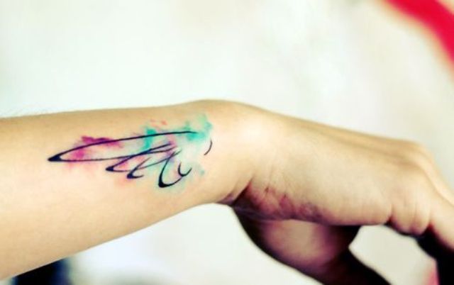 Watercolor wing tattoo
