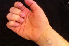 White star on the right wrist