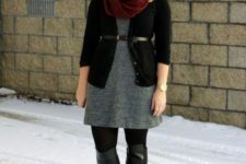 With black cardigan, gray dress and high boots