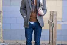With brown shirt, tweed jacket, jeans and boots
