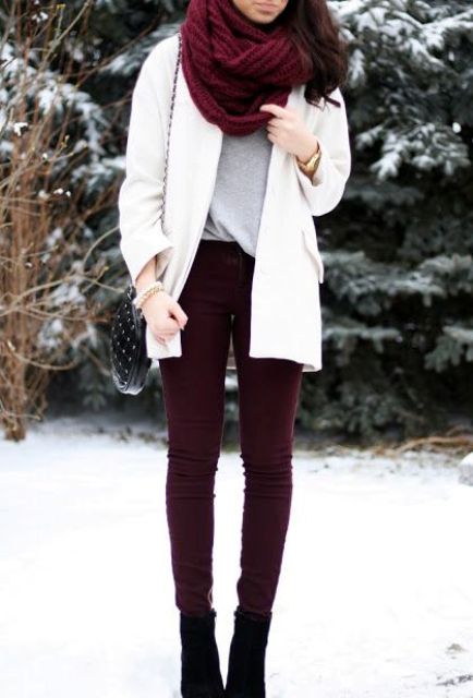 With gray loose shirt, white jacket, marsala trousers and ankle boots
