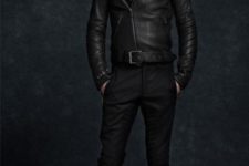 With leather jacket, black trousers and high boots