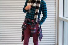 With plaid shirt, printed sweater, marsala pants, gray sneakers and beanie