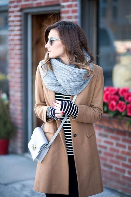 With striped shirt, camel coat and crossbody bag
