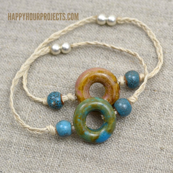DIY hemp bracelet with a ceramic donut bead (via happyhourprojects.com)