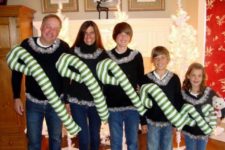 ugly family look with an oversized candy cane