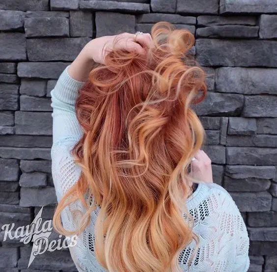 firery red hair with balayage nude blonde ends