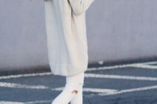 02 white ripped jeans, an oversized white sweater and brown ankle boots