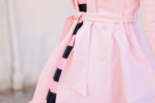 04 a pink and black striped dress and a pink coat over it