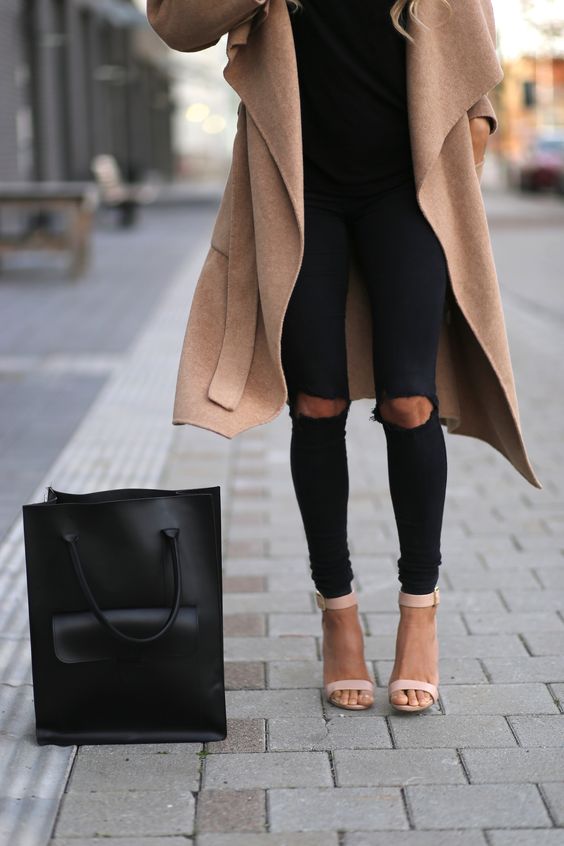 black ripped skinnies, blush heels, a black tee and a camel coat