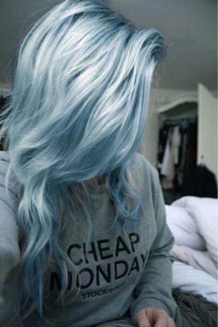 soft and light blue color with darker roots