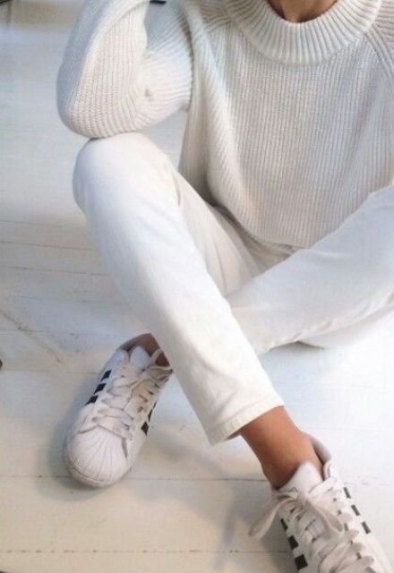 white denim, a white sweater and chucks for a minimal look