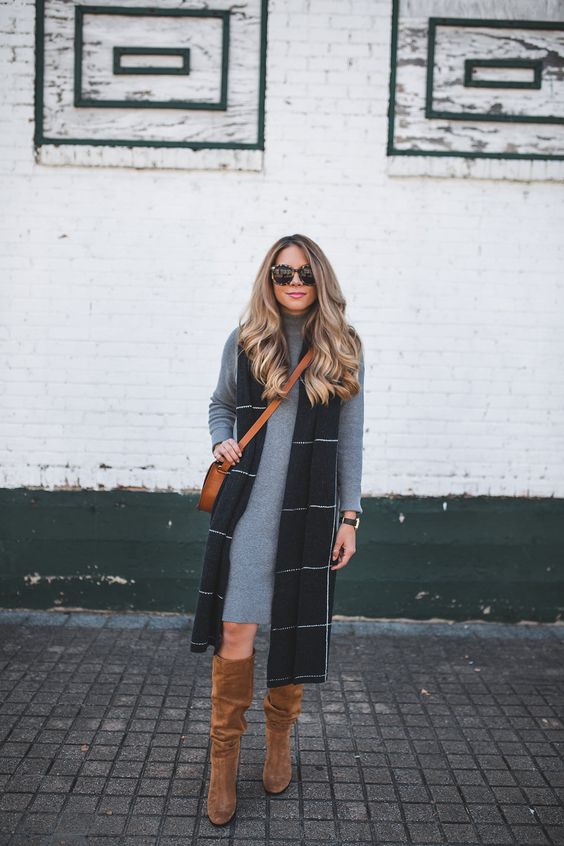grey sweater dress, a long vest and ocher suede boots