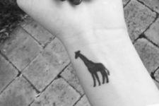 Black giraffe on the wrist