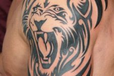 Black lion tattoo