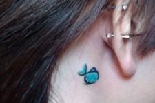 Blue fish behind the ear