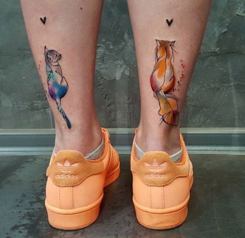Cat tattoos on the legs