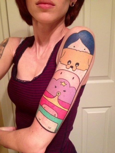 Colorful Adventure Time themed tattoo