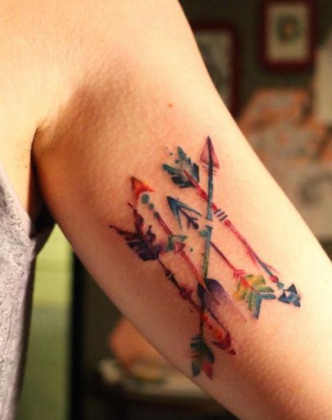 Colorful arrows tattoo