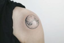Cool moon tattoo on the shoulder