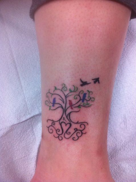 Family tree with birds tattoo