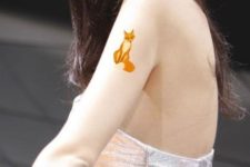 Fox tattoo on the arm