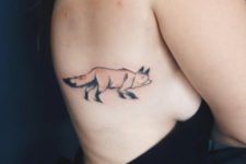 Fox tattoo on the right side