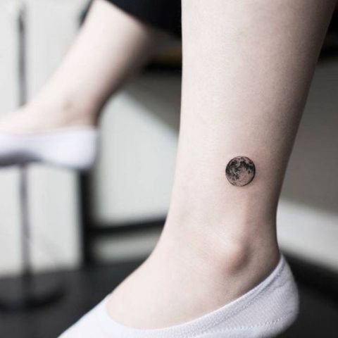 Full moon tattoo on the ankle