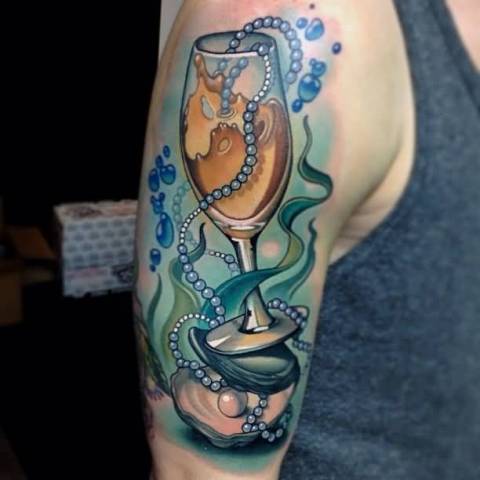 Glass with pearl tattoo