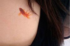 Gold fish on the chest