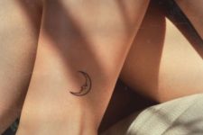Moon tattoo on the ankle