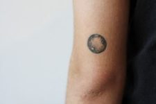 Moon tattoo on the arm