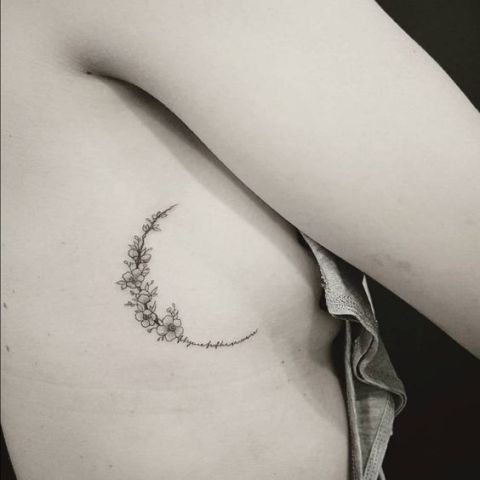 Moon with flowers tattoo